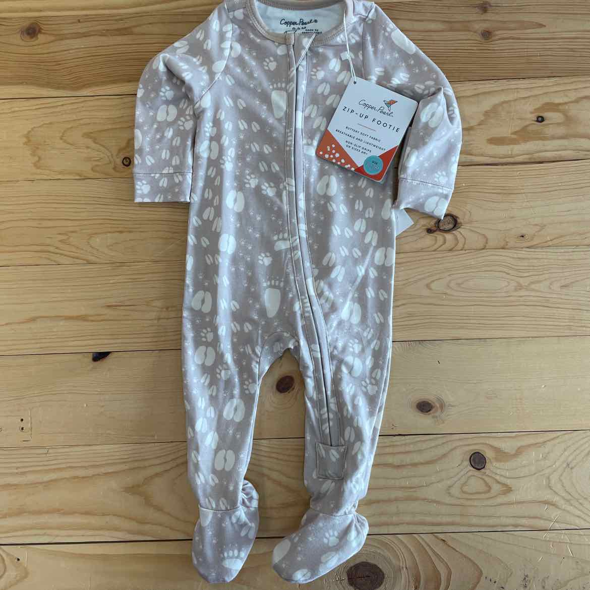 NEW! COPPER PEARL FOOTIES-TRACKER 0-3 MOS