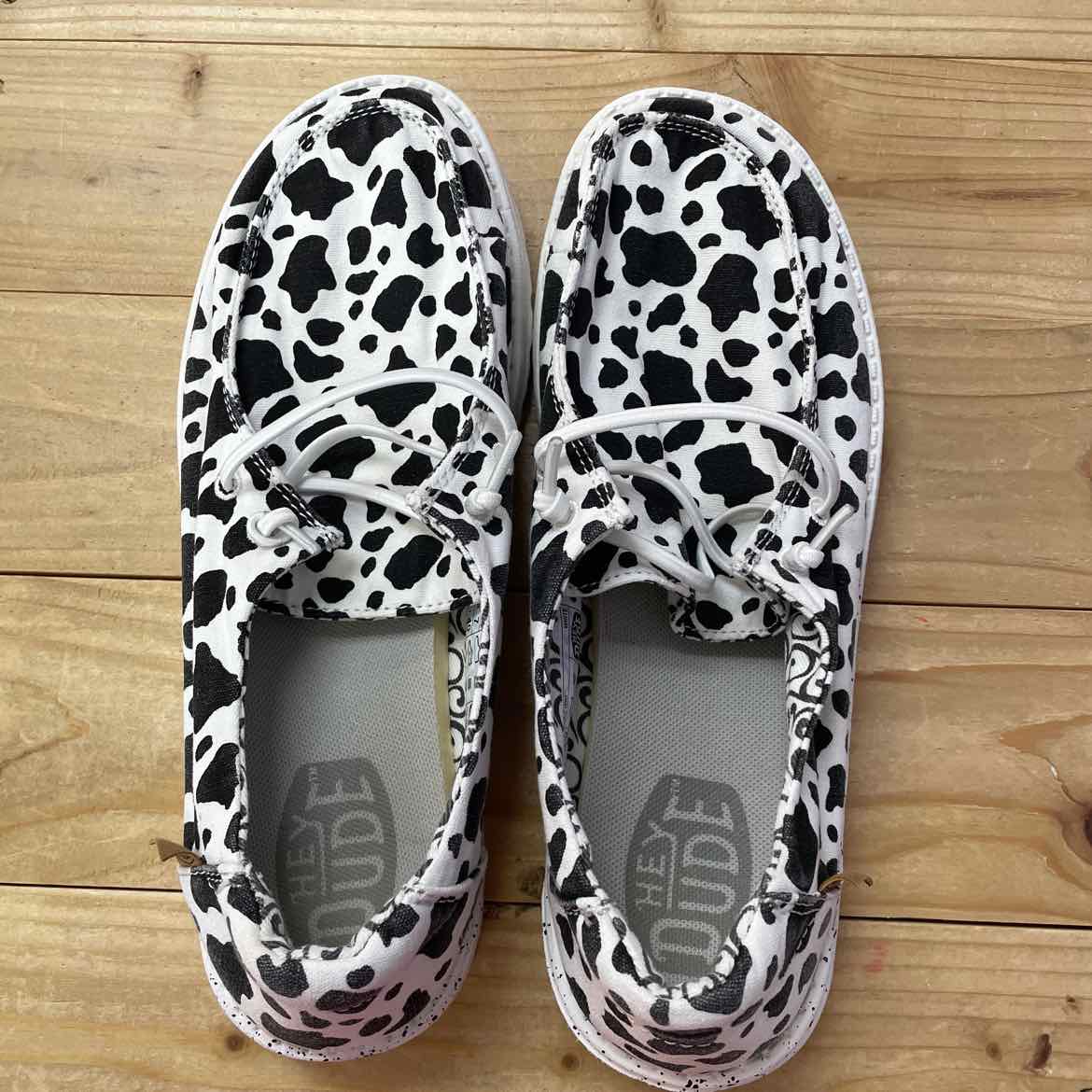 HEY DUDE WENDY COW PRINT SHOES 9